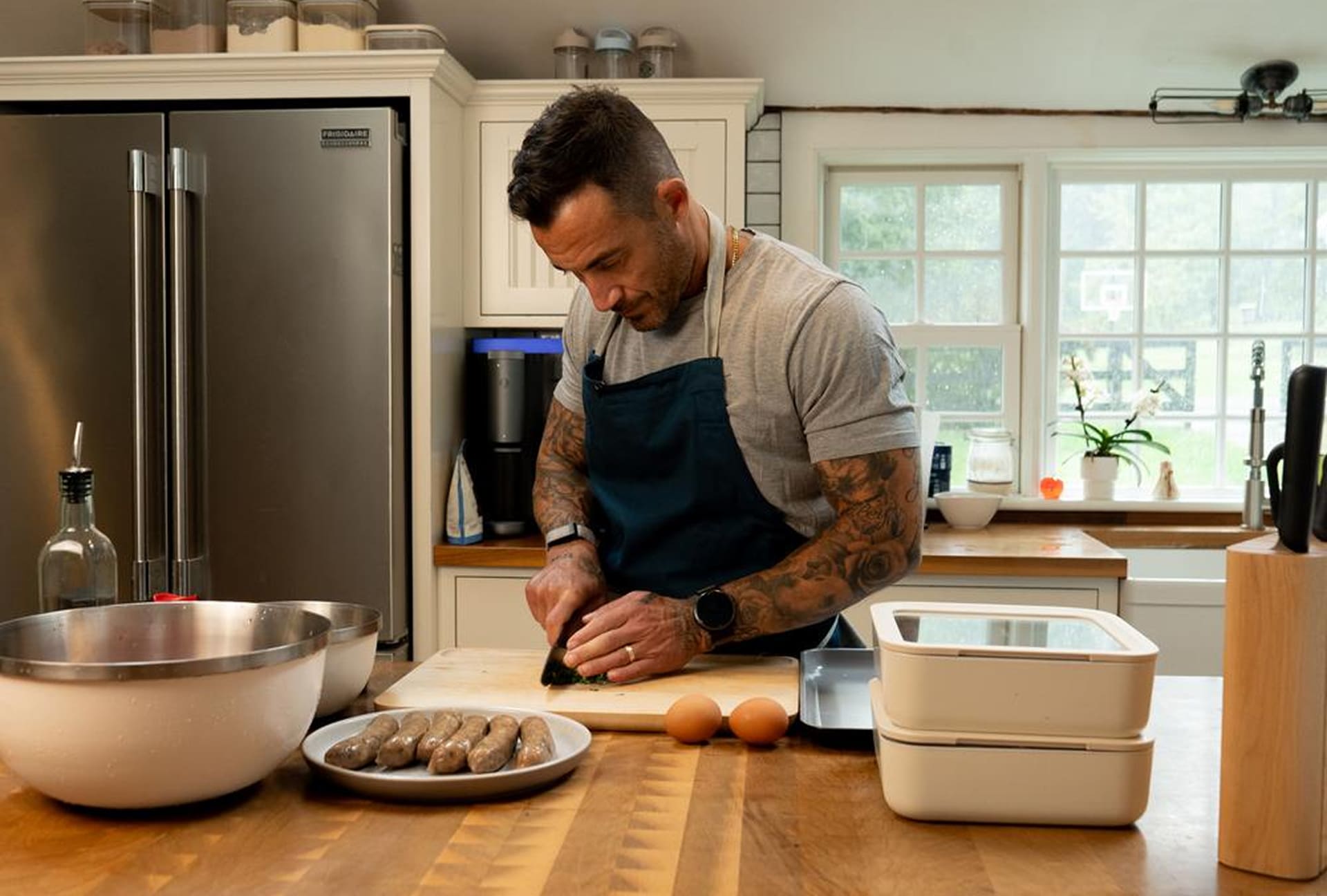 Michael Chernow prepping ingredients in his kitchen