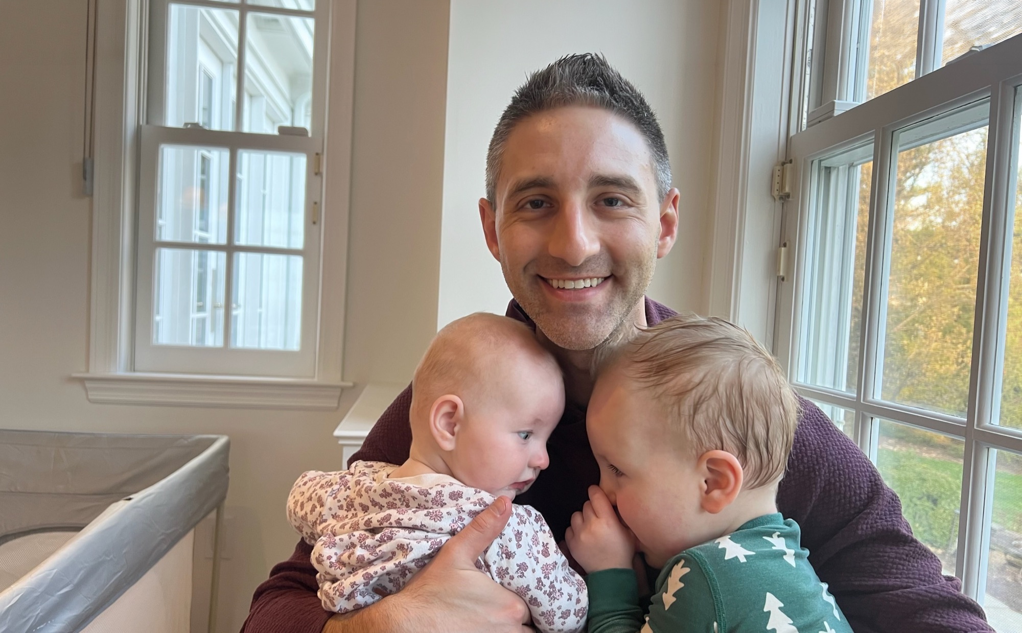 Jordan Nathan with child