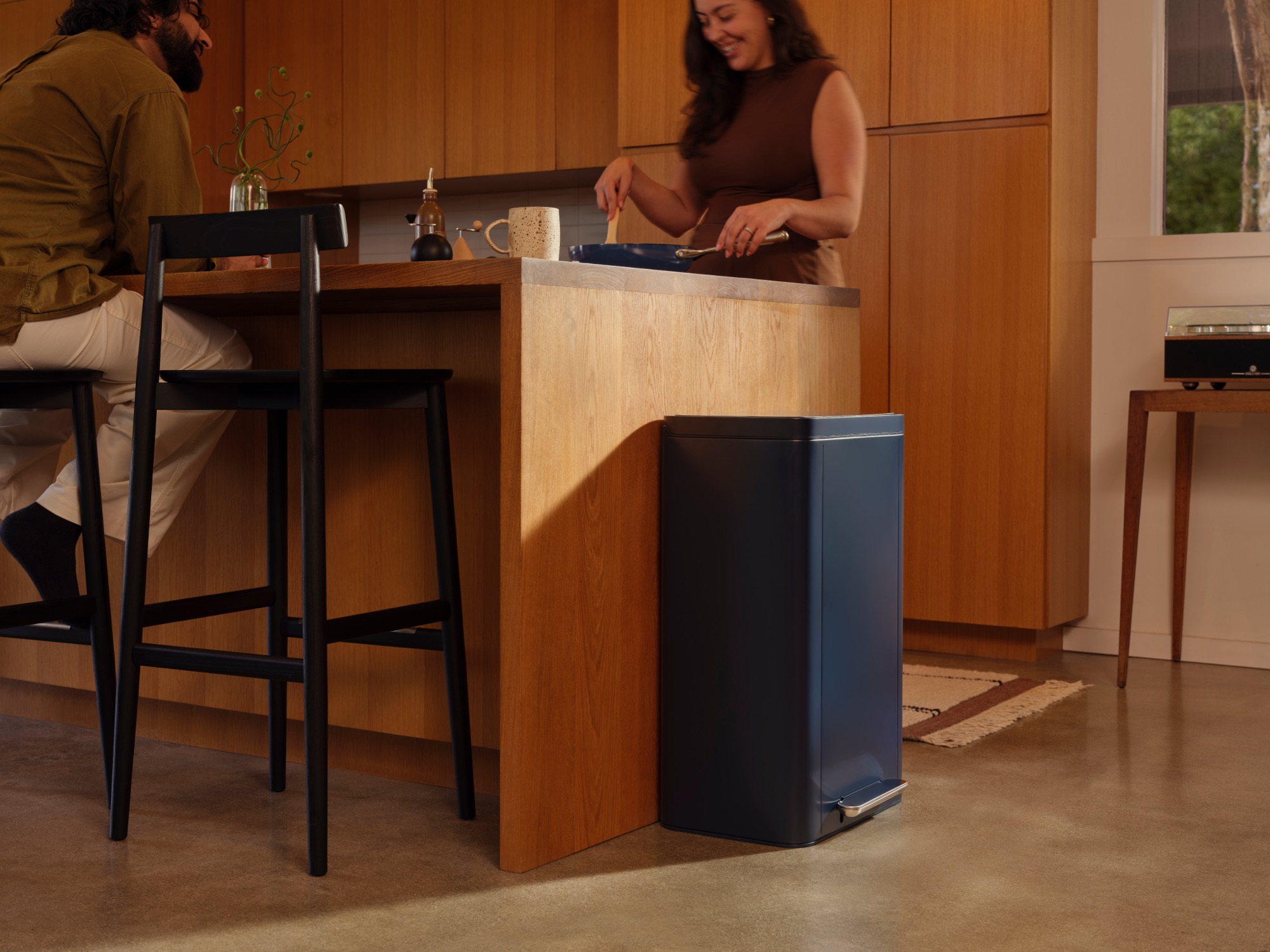 Navy Caraway trash can in kitchen corner